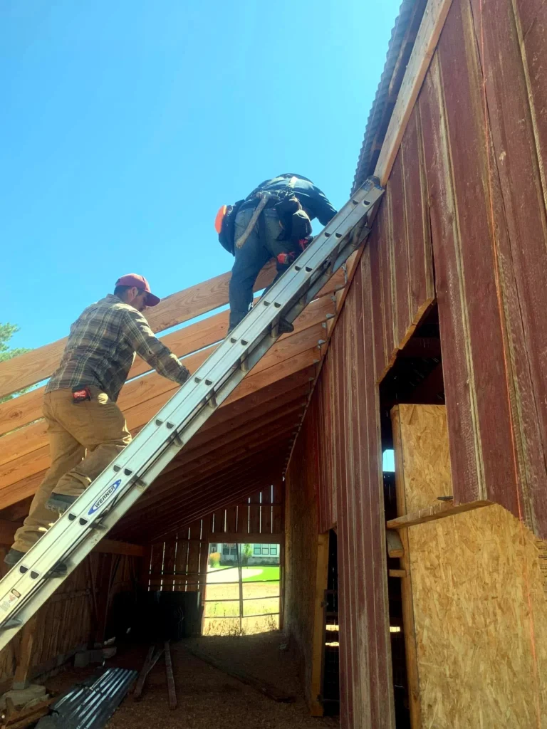 Crew painting a home exterior in Midway