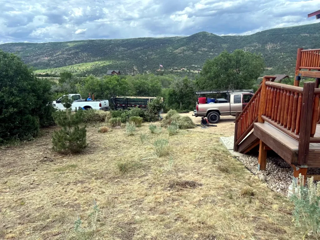 Boulder wall and terraced landscaping at a Heber City property