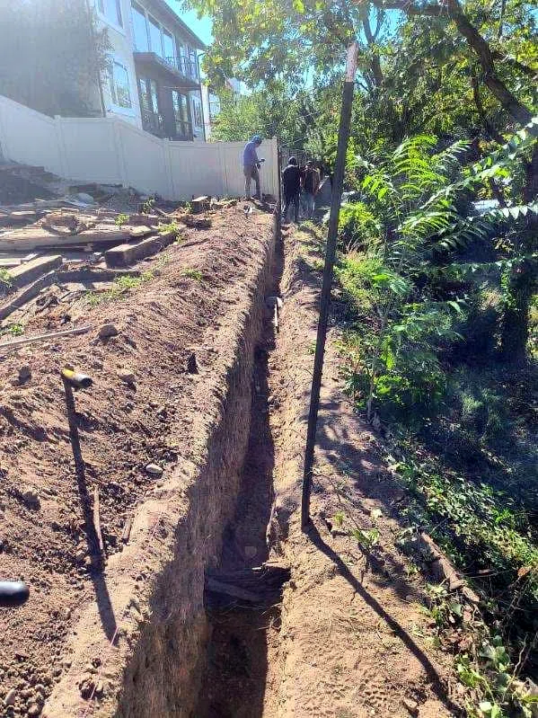 Retaining wall construction on a sloped Midway lot