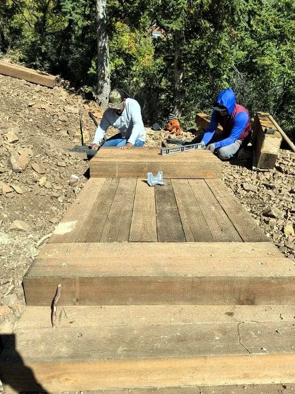Boulder wall and terraced landscaping at a Kamas property