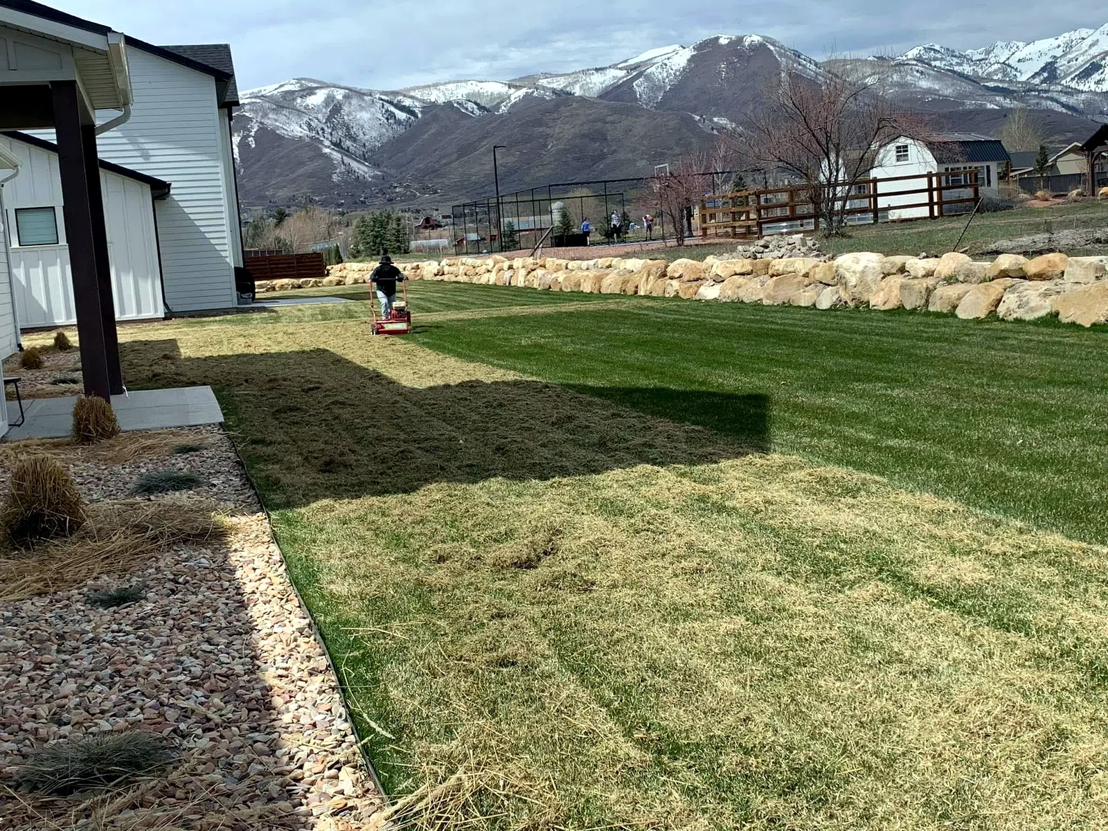 Freshly installed lawn and planting beds with mountain views at a Heber Valley home