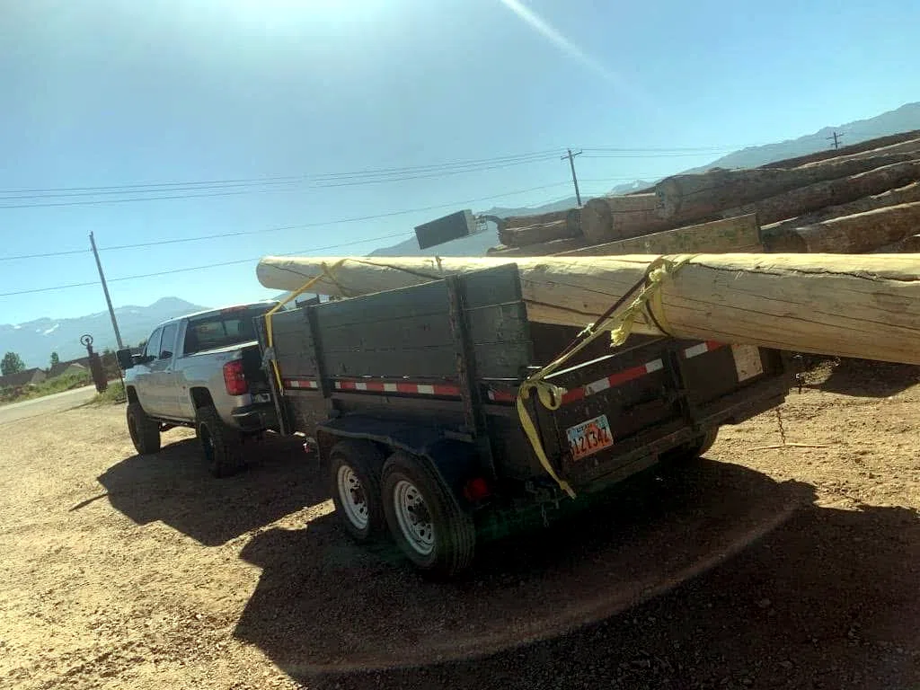 Dump truck loaded with material at an active landscaping site